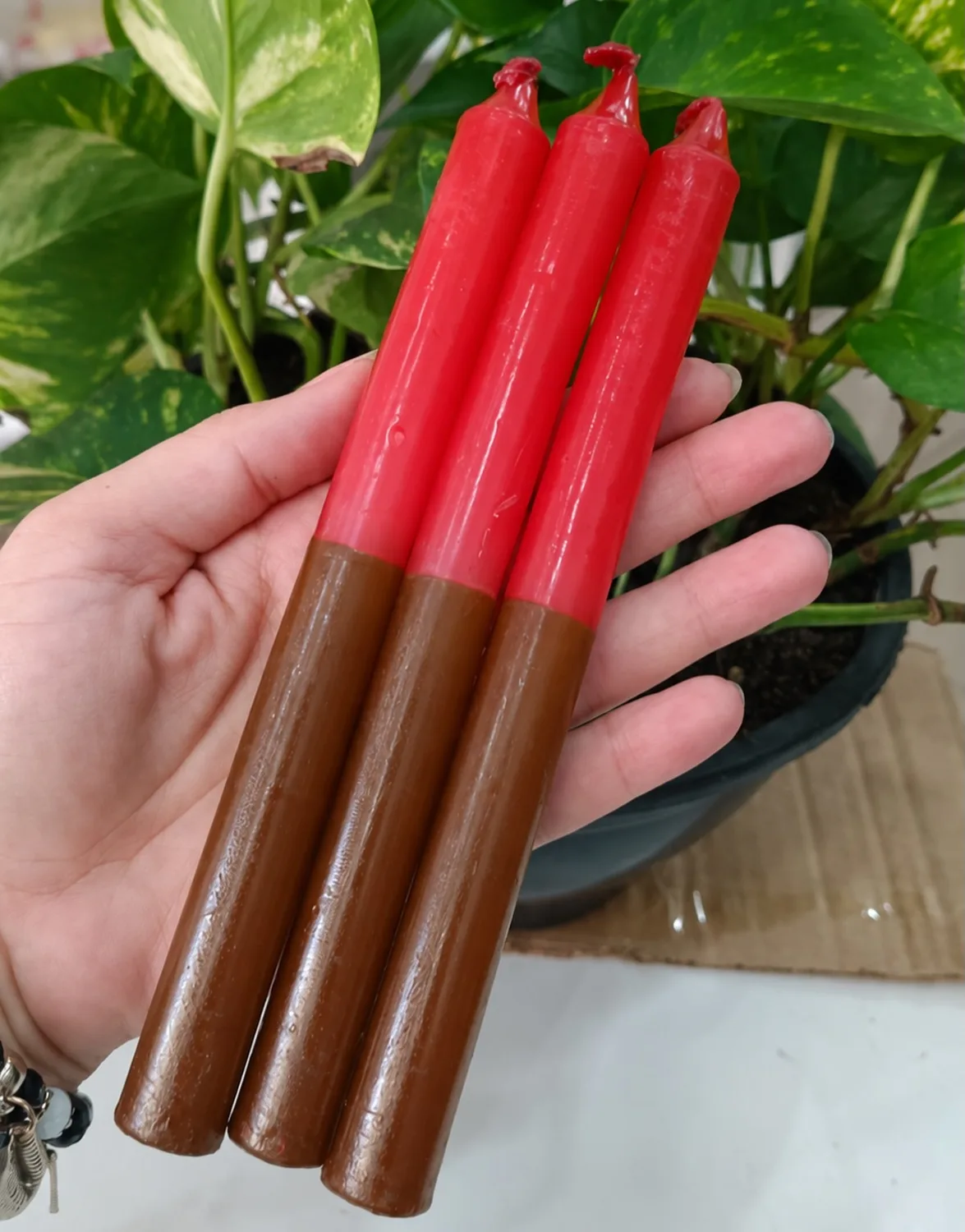 Vela palito bicolor marrom e vermelha (Xangô)